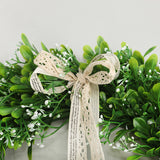 Green Wreath with white flowers