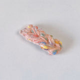 Artisan Crochet Design: Small Textured Pattern with Floral Accents Children's hair pin